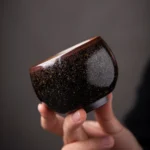 Full product view of handcrafted gold fleck Jian Zhan oil spot chawan tea bowl