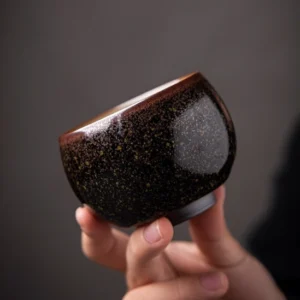 Full product view of handcrafted gold fleck Jian Zhan oil spot chawan tea bowl