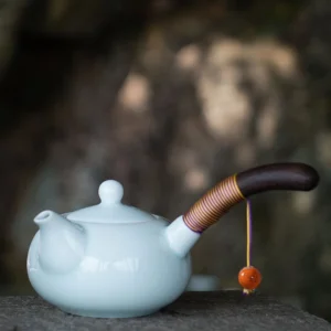 Full view of 225ml handcrafted ceramic Kyusu teapot with wooden side handle