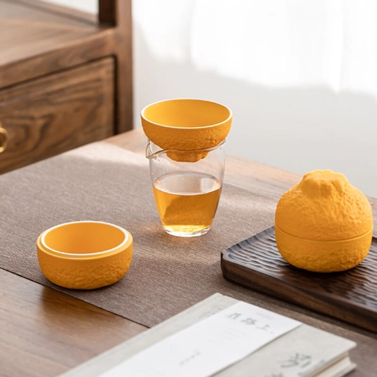 handcrafted lead-free orange ceramic loose leaf tea strainer product display