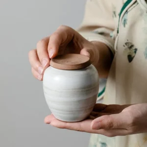 handcrafted mini ceramic tea jar with natural white glaze