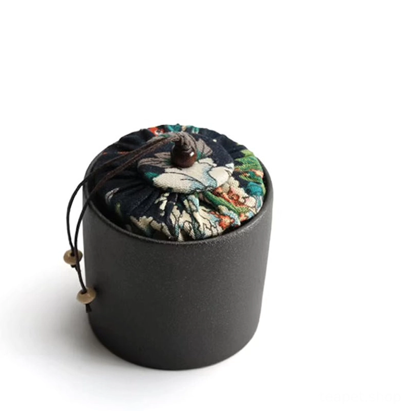 side view of handcrafted mini travel tea canister