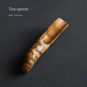 Full length view of handcrafted one-of-a-kind natural bamboo root tea scoop