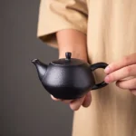 handcrafted textured japanese black clay teapot 170ml front view