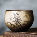 Handcrafted vintage Chinese clay chawan tea bowl front view hand carved landscape motif
