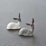 Main view of handcrafted white reclining lucky deer ceramic tea pet for gongfu tea table
