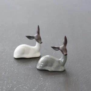 Main view of handcrafted white reclining lucky deer ceramic tea pet for gongfu tea table