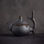 full side view of handcrafted zen black ceramic teapot 240ml