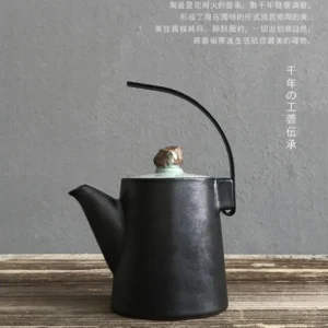 handmade black ceramic teapot with natural stone lid