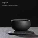 Two styles of handmade black clay chawan tea bowls side by side comparison