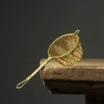 full view of handmade brass loose leaf tea strainer