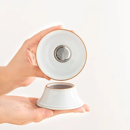 handmade ceramic loose leaf tea strainer with matching base full view