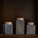 Collection of handmade retro ceramic tea jars with wooden lids