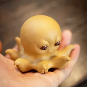 handmade yixing zisha sassy octopus tea pet on wooden tea tray main product view