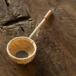 handwoven bamboo loose leaf tea strainer with wooden handle full view