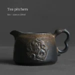 full side view of jingdezhen embossed dragon pattern gong dao bei tea pitcher