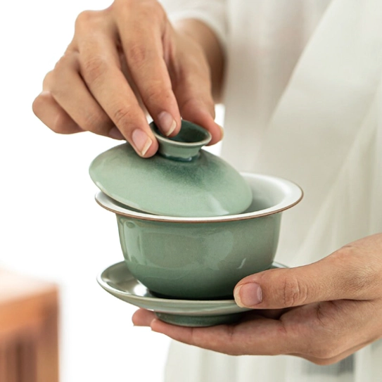 Close up of crackle glaze texture on cyan Jingdezhen gaiwan