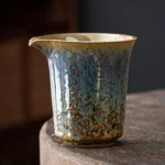 full side view of 200ml kiln-transformed ceramic tea fairness pitcher