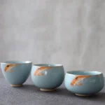 full set of three blue koi ice crack porcelain teacups