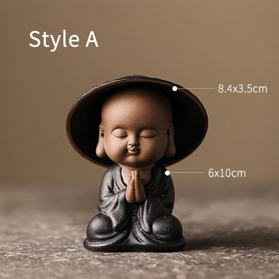 close up of smiling little monk tea strainer facial details