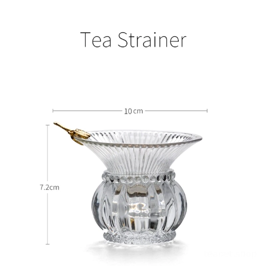 gold decorative hanging accent on the glass loose leaf tea strainer