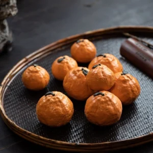 Lucky realistic orange ceramic tea pet on bamboo tea tray with teaware