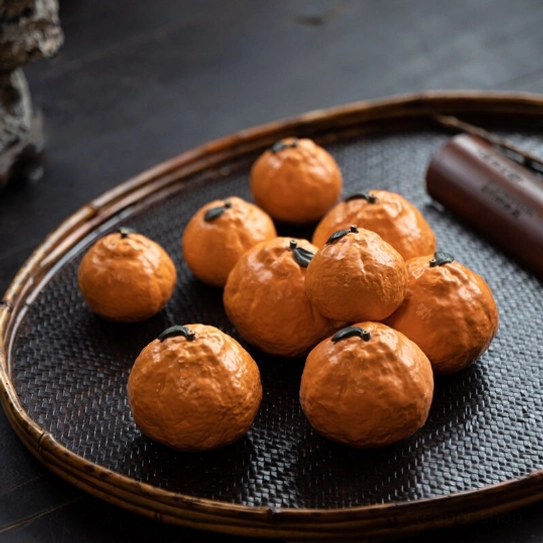 Lucky realistic orange ceramic tea pet on bamboo tea tray with teaware