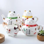 full set view of 300ml maneki neko ceramic teapot with red collar