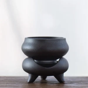 matte black ceramic loose leaf tea strainer with stand full product view