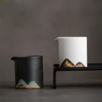 Handcrafted mountain ceramic Gong Dao Bei pouring tea into a teacup