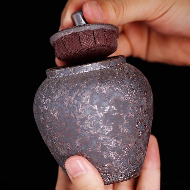 natural mottled texture on vintage ceramic tea jar