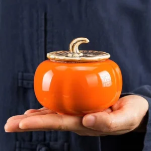 Persimmon shaped ceramic tea jar front view