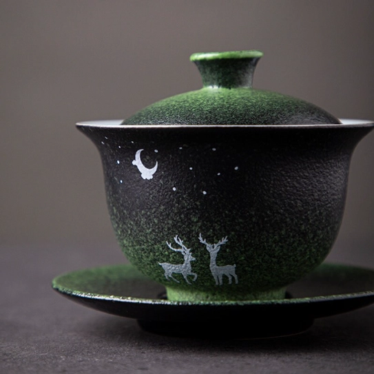 artistic moon deer star porcelain gaiwan close up of lid
