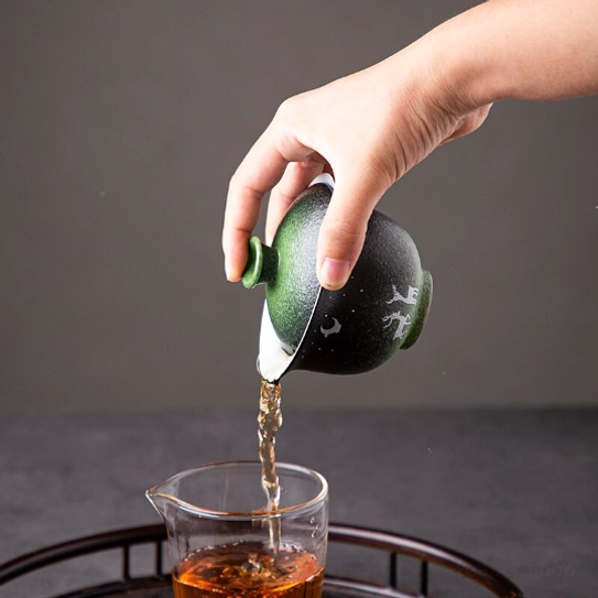 porcelain gaiwan showing inner white surface and outer gradient glaze