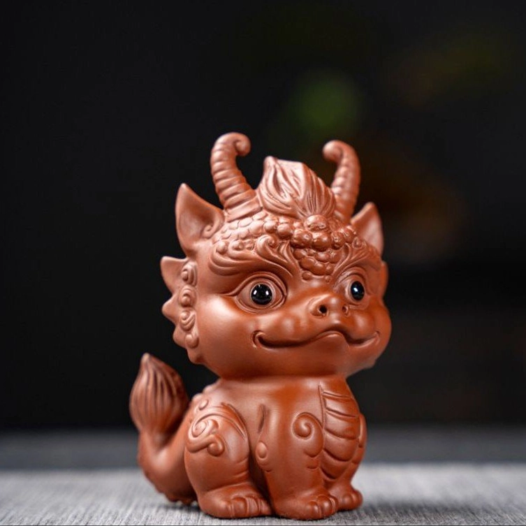 red zisha qilin dragon tea pet close up detail