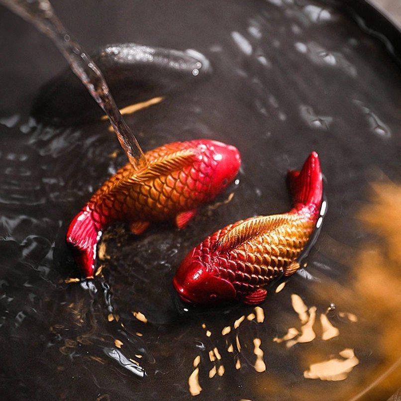 set of two color changing koi fish tea pet on tea tray