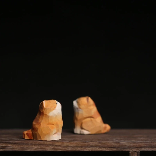 Side view of hand-painted orange and white cat tea pet