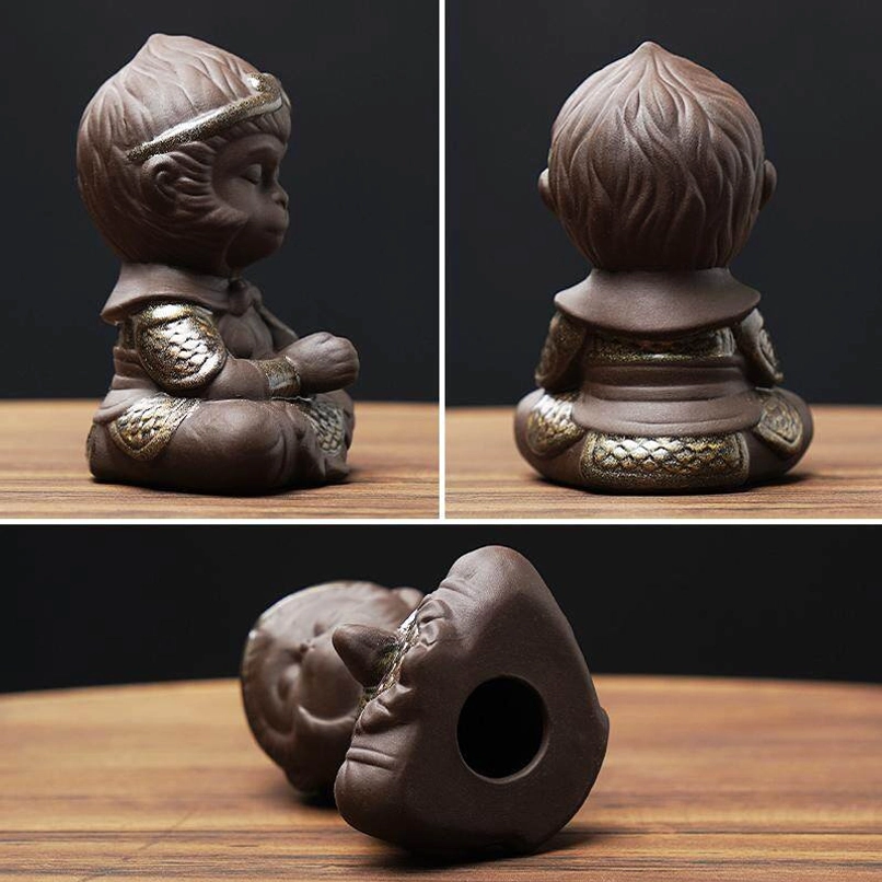 side angle of meditating sun wukong zisha tea pet figurine