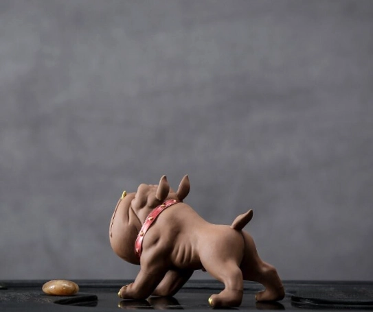 Side view of standing French bulldog zisha tea pet showing hand-carved muscle texture