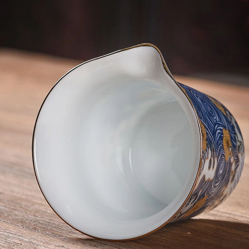 close up of blue wave gold floral pattern on gong dao bei