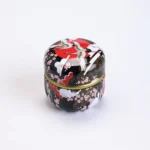 style A black japanese matcha tea jar with crane cherry blossom design