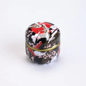 style A black japanese matcha tea jar with crane cherry blossom design