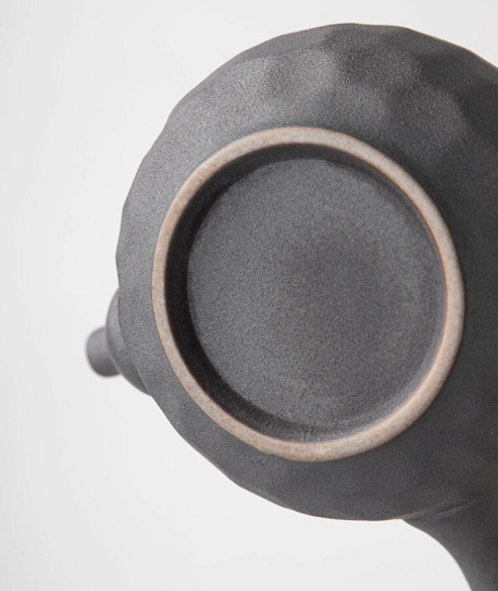 close up of textured surface on ceramic kyusu teapot
