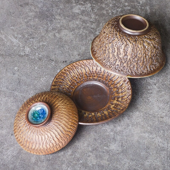 top view of brown textured mini gaiwan tea set