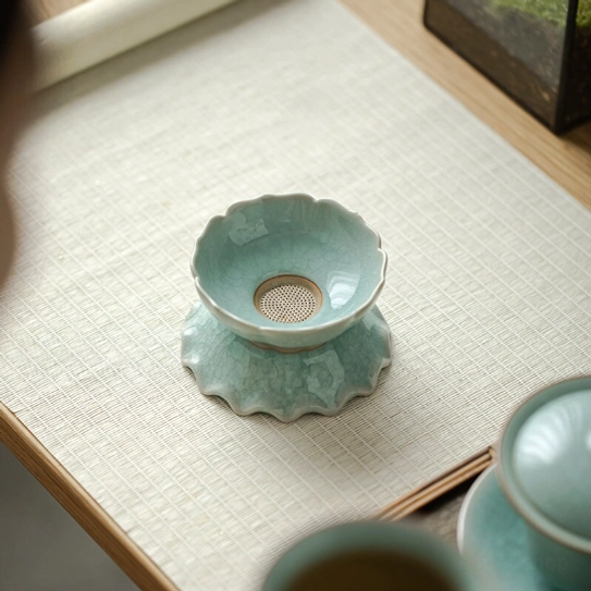 top view of petal shaped rim of ceramic lotus loose leaf tea strainer