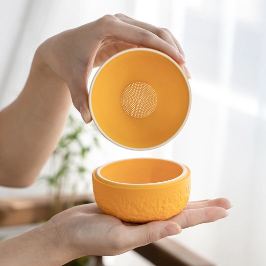 orange loose leaf tea strainer two piece split view