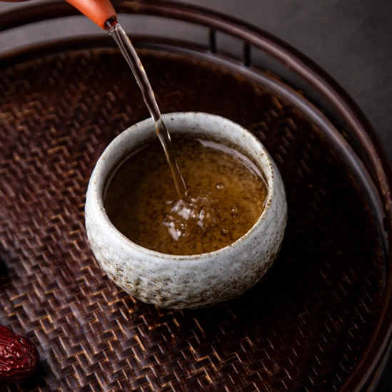 Close-up of unique handcrafted texture on rustic chawan tea bowl
