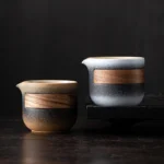 full product view of vintage Chinese ceramic 170ml tea pitcher gongdao bei with wood handle