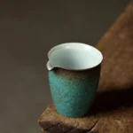 full side view of vintage crackle glaze chinese ceramic gong dao bei tea pitcher 250ml