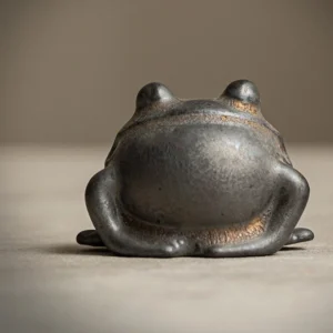 vintage gilded glaze ceramic frog tea pet as teapot lid rest on tea tray